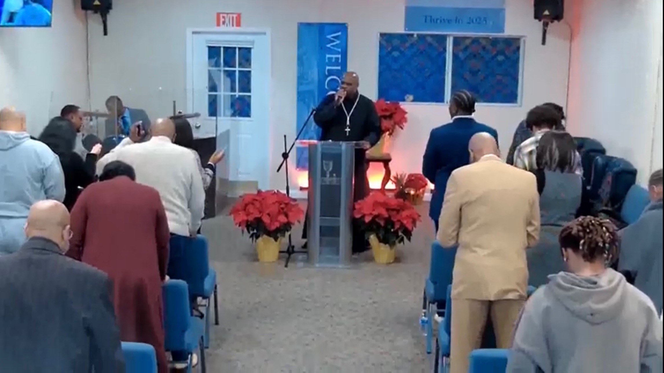 The congregation worshiping at True Holiness Evangelistic Church